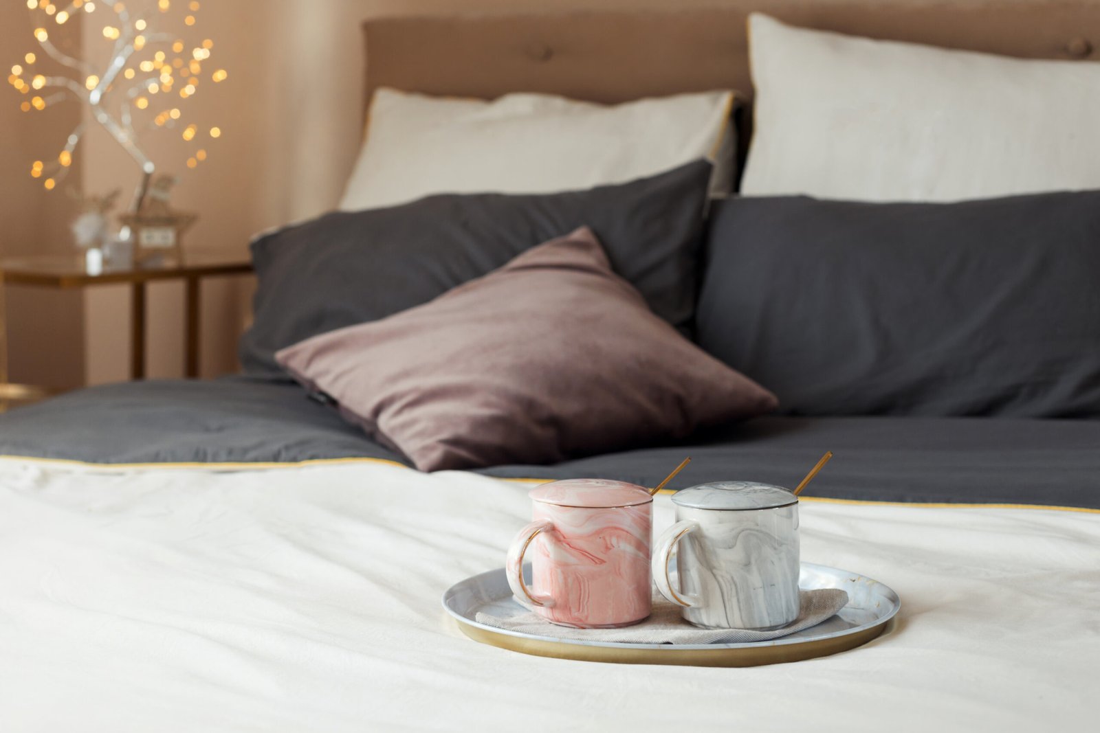 two-cups-of-hot-coffee-on-a-tray-in-bed-in-a-cozy-2025-02-10-12-54-31-utc